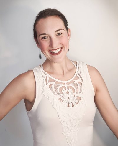 alt=professional headshot of caitlin haywood dance teacher